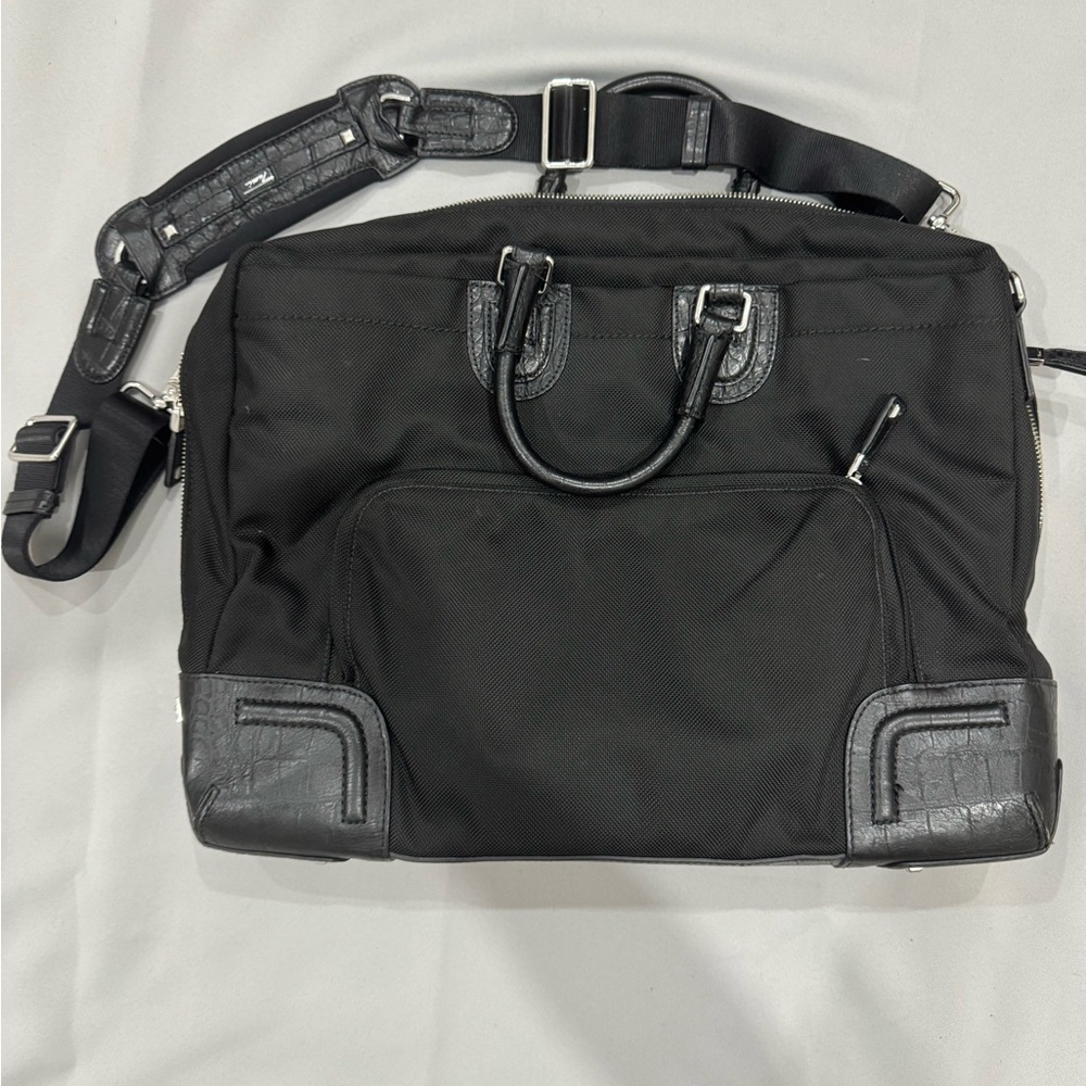 Tumi Travel Black Briefcase with Leather Finish and Metal Accents